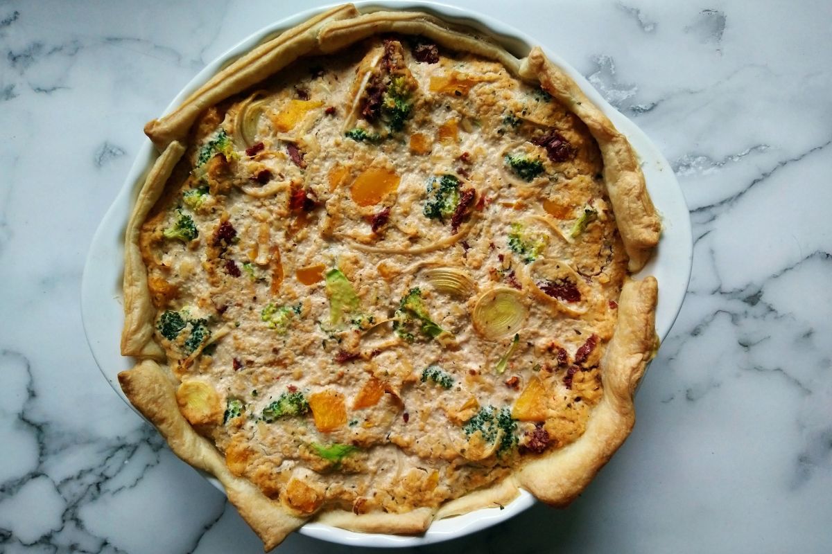 Spinach, Mushroom, And Artichoke Quiche with Spelt Crust